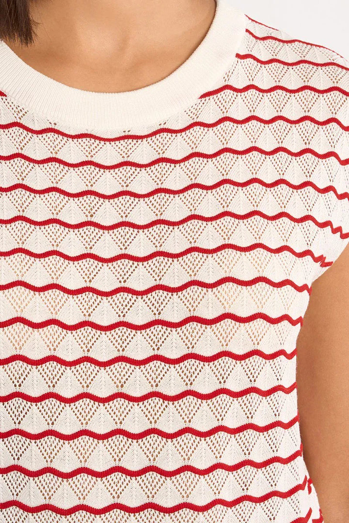 Lili Sidonio Elsie striped sweater top featuring a cozy knit fabric, round neckline, and colorful horizontal stripes.