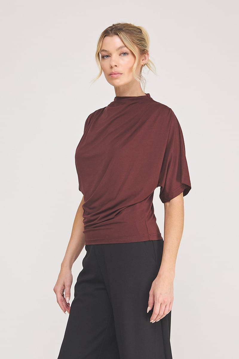 Allie Rose Adley mock neck top in a fitted style, featuring long sleeves and a classic neckline, shown on a neutral background.