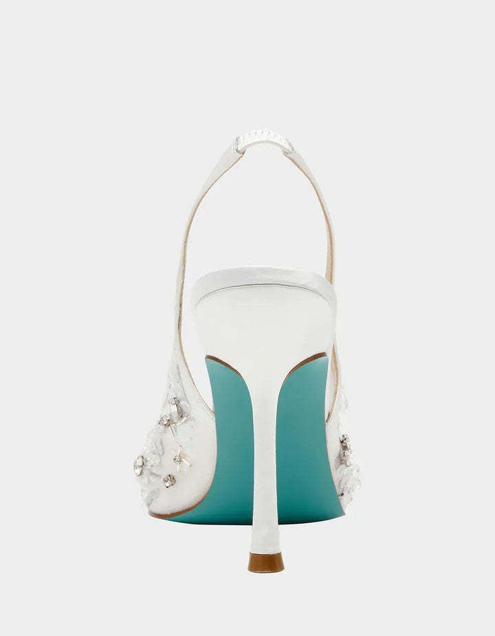 Betsey Johnson Eddie Slingback sandal featuring a stylish strap design and a comfortable heel for casual or dressy occasions.