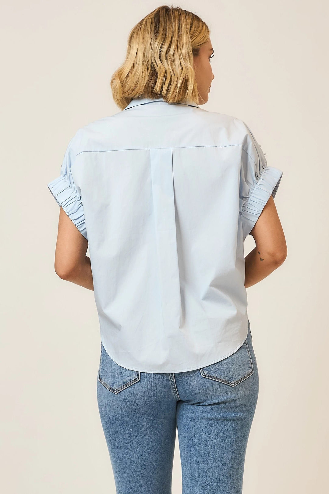 Cozy Co. Angie Pearl Studded Button Up Top showing a stylish long sleeve top with pearl accents and button details.