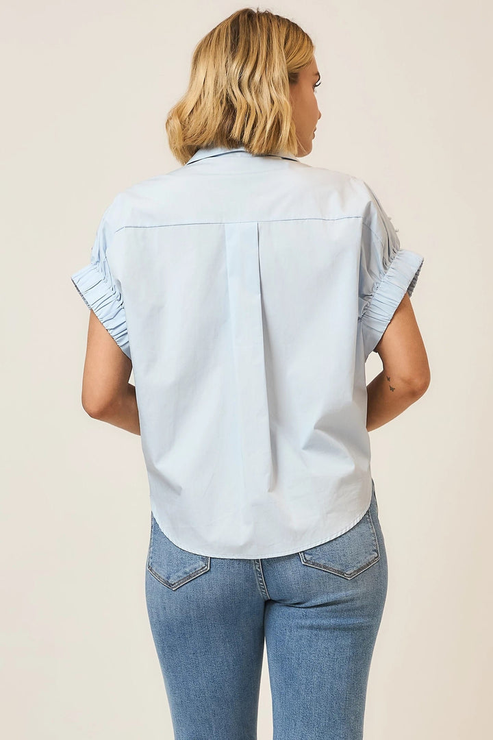Cozy Co. Angie Pearl Studded Button Up Top showing a stylish long sleeve top with pearl accents and button details.