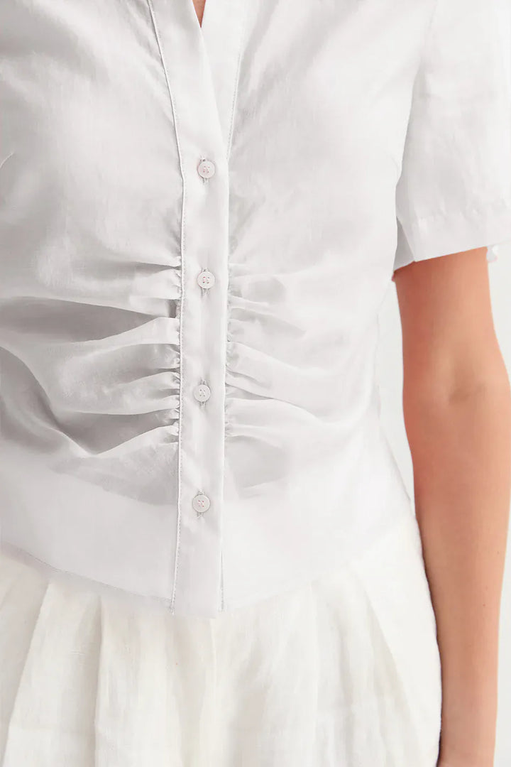 Crescent Lola Tencel button-up top in soft, breathable fabric with a classic collar and button-front design.