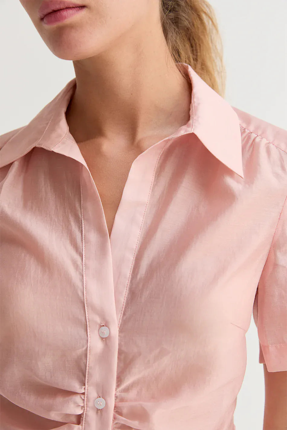 Crescent Lola Tencel button-up top shown on a mannequin, featuring a relaxed fit and soft fabric in a neutral color.
