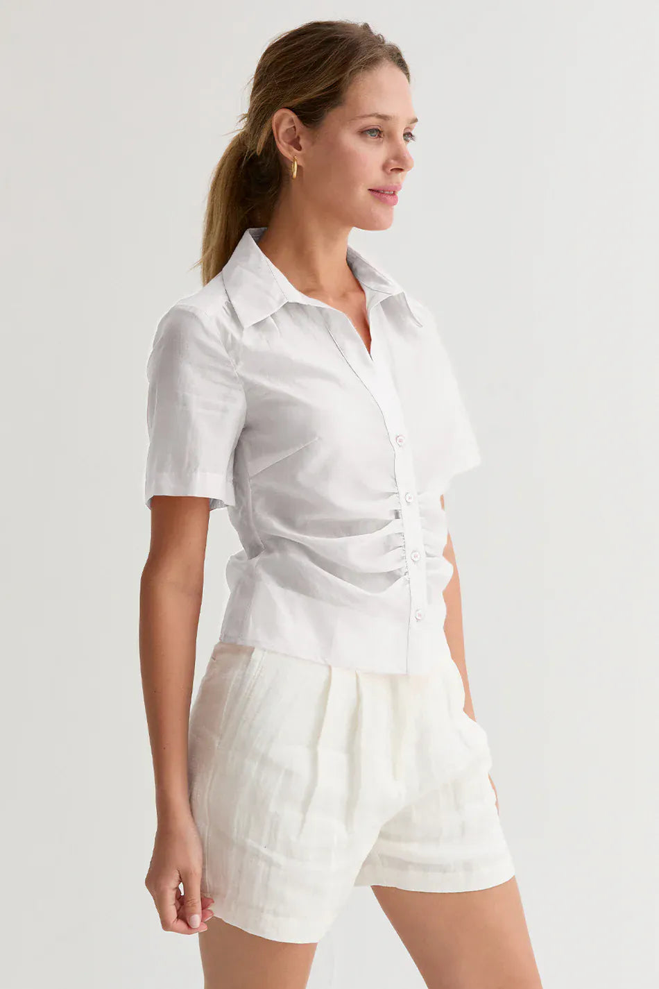 White Crescent Lola Tencel button-up top, lightweight blouse with collar and button closure, casual and stylish for everyday wear.