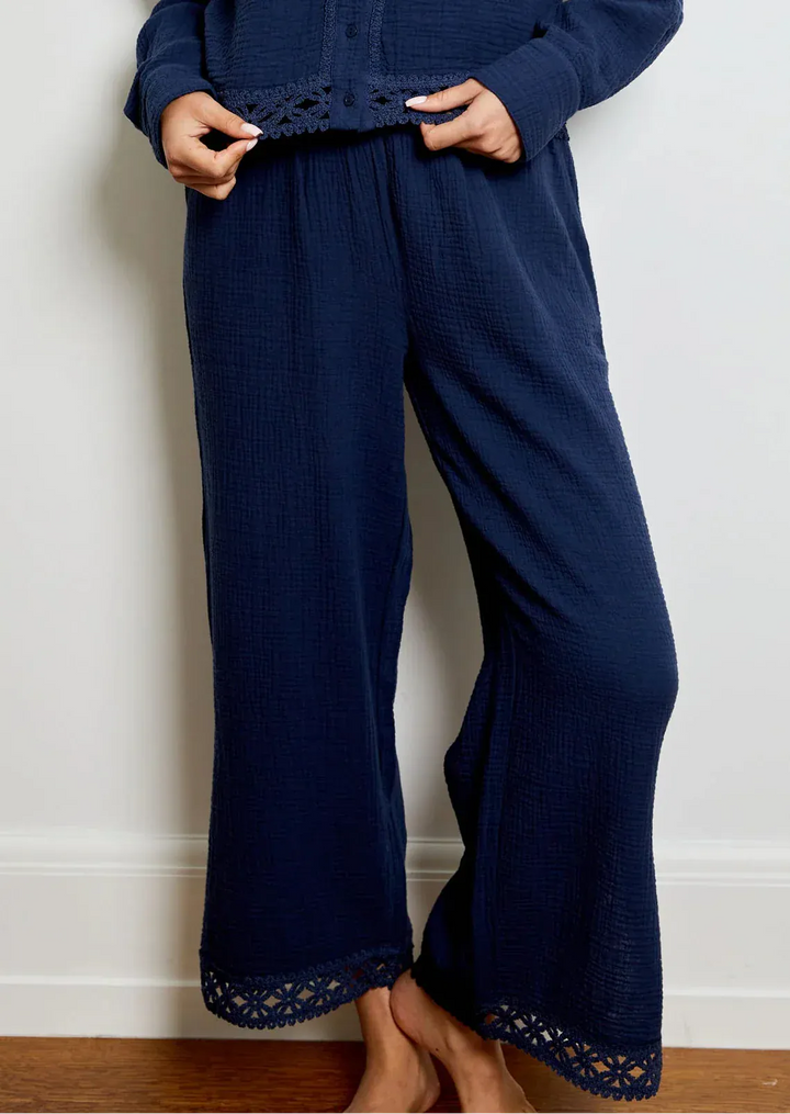 Navy Celine Gauze Lace Pant by Design History New York, lightweight pants with lace detailing, shown on a model.