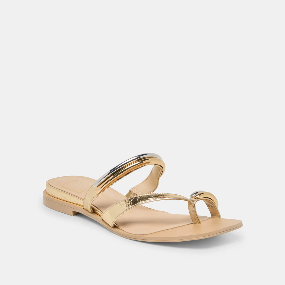 Gold leather Dolce Vita Tarina sandals with ankle straps and open toe design, stylish and comfortable for casual wear.