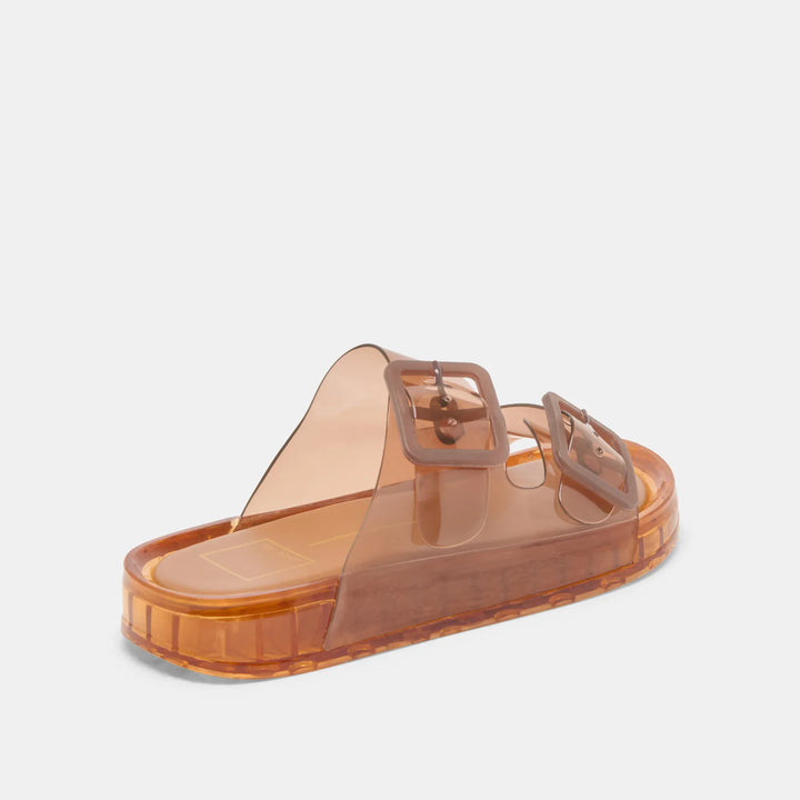 Dolce Vita Julio Sandals featuring strappy design with flat sole and ankle buckle, perfect for casual summer wear.
