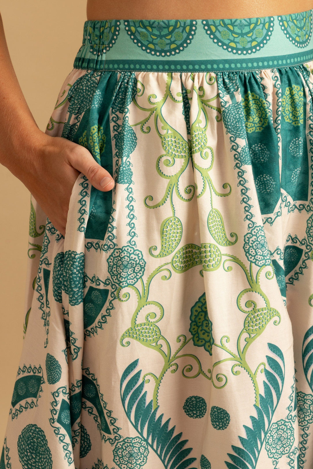 Double A Maeve Maxi Skirt with flowing fabric and elastic waistband, shown in a neutral tone against a plain background.
