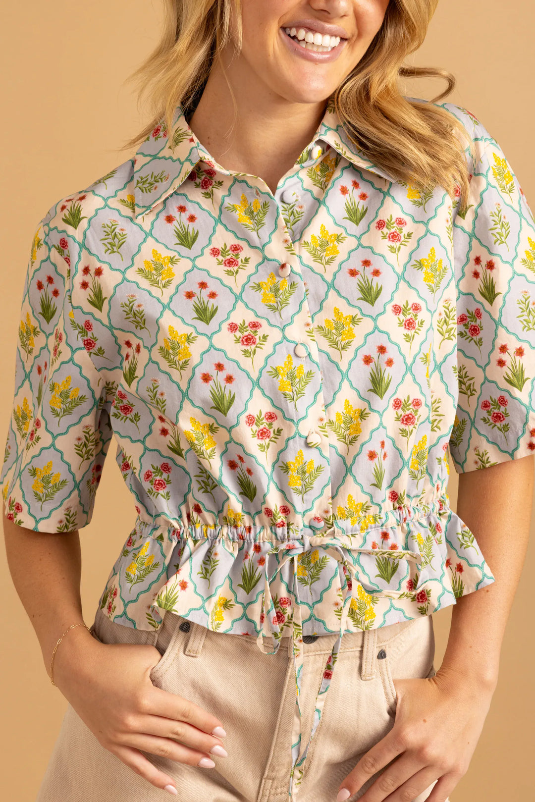 Double A Anya Top in soft fabric, featuring a stylish design with a rounded neckline and short sleeves.