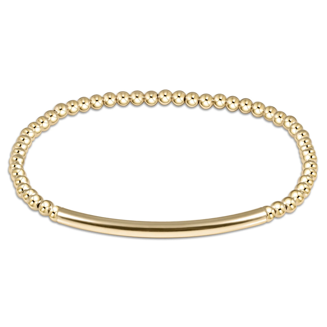 Enewton Bliss Bar Smooth Gold 3mm bracelet featuring a sleek gold bar design and a secure clasp.