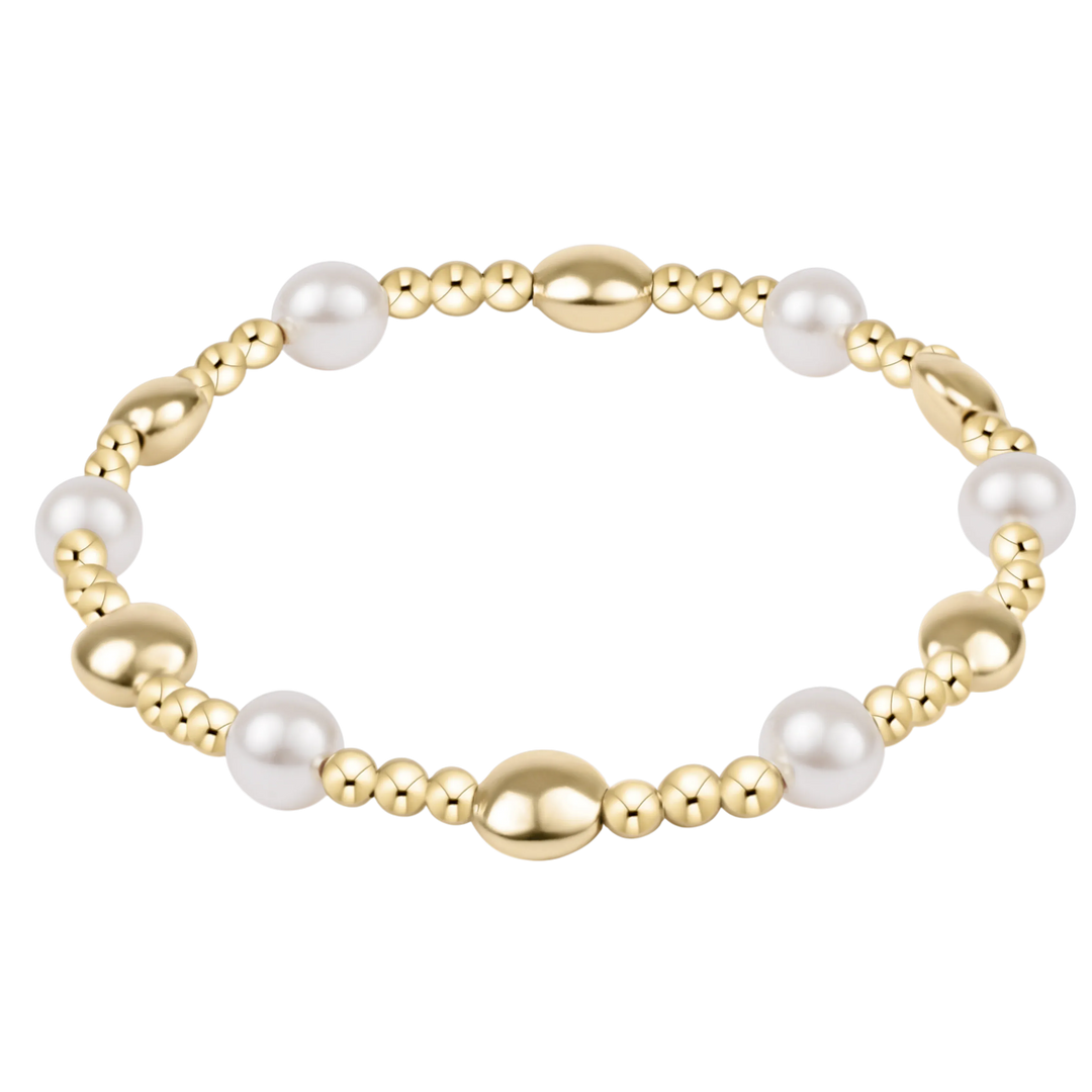 Enewton Honesty Sincerity Pearl 6mm bracelet featuring elegant white pearls on a delicate string, showcasing craftsmanship and style.