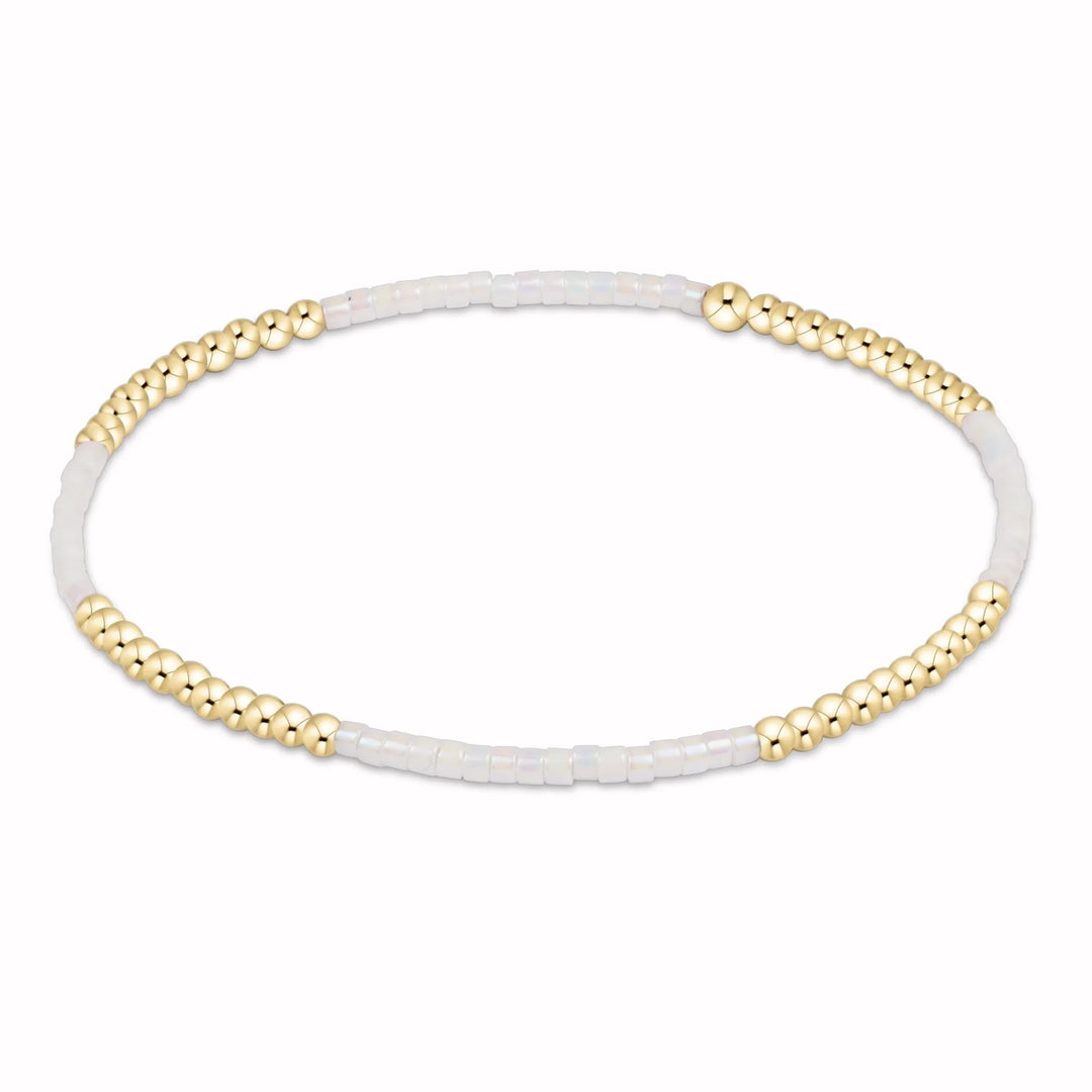 Hope Blissful bracelet by enewton, silky white bracelet with a delicate, elegant design featuring smooth, shiny beads.