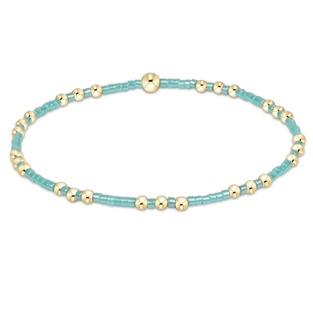 Enewton Hope Joy bracelet featuring sea glass beads on a delicate string, stylish accessory with natural ocean-inspired elements.