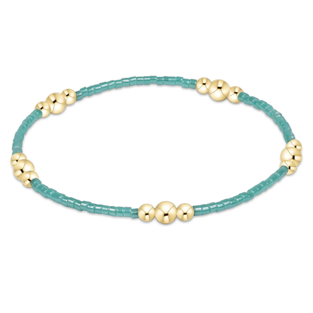 Enewton Hope Purpose Gold Bracelet with sea glass beads, delicate jewelry piece featuring a shimmering gold finish
