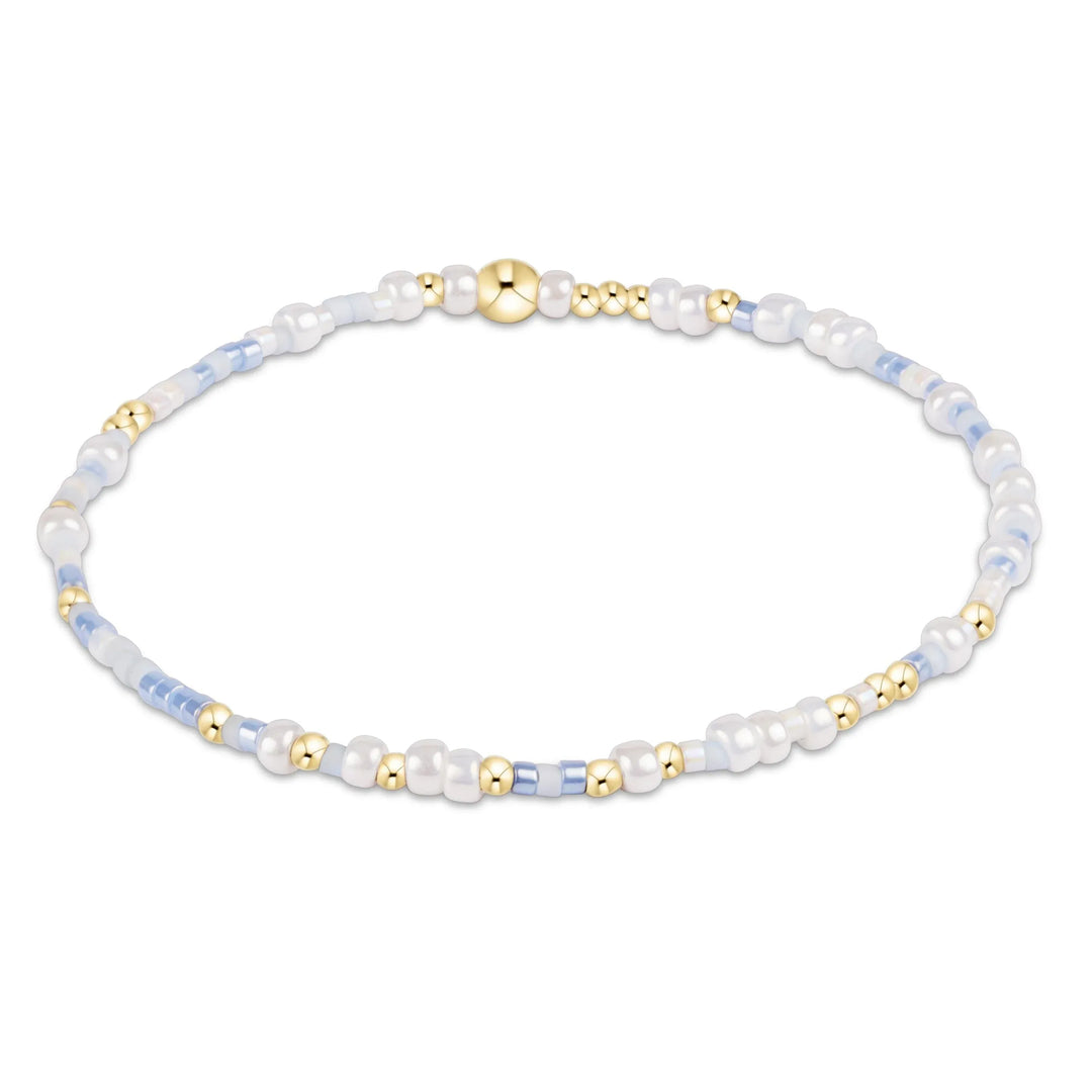 Enewton Hope Unwritten bracelet featuring a silver band with engraved inspirational message, stylish accessory for everyday wear.