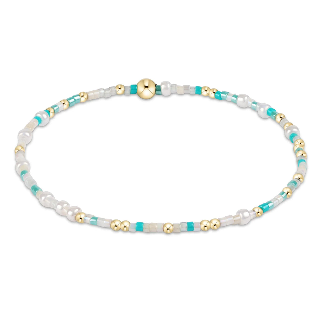 Hope Unwritten Bracelet by enewton featuring turquoise beads and a silver charm, perfect for a stylish and meaningful accessory.