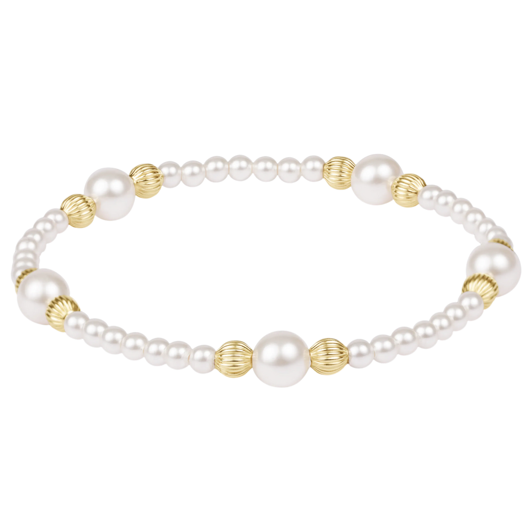 Enewton Purpose Pearl 6mm Dignity Pearl Bracelet featuring elegant white pearls on a delicate bracelet.