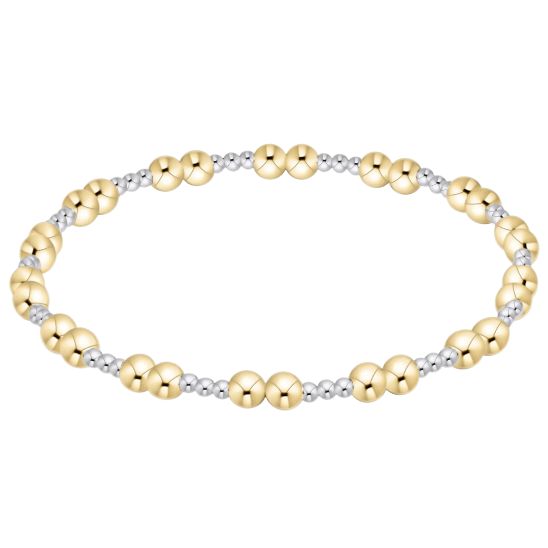Enewton mixed metal 4mm bracelet featuring intertwined silver and gold-tone links for a stylish accessory.