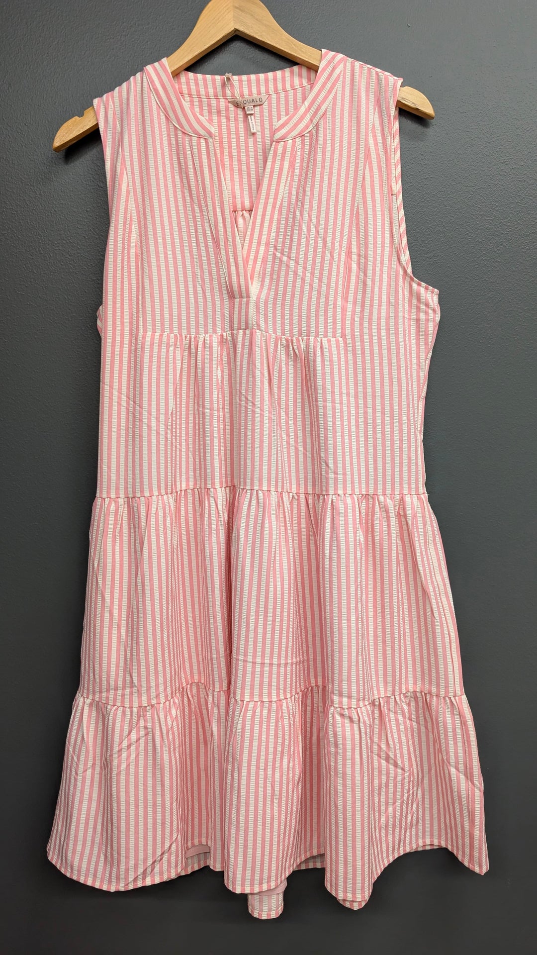 Esqualo Zoey striped dress displayed on hanger with colorful horizontal stripes and short sleeves, casual summer style.