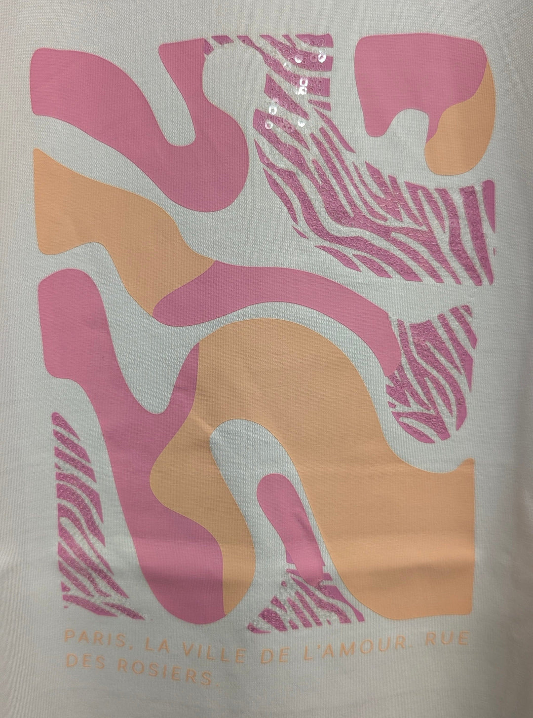 Esqualo Paris Rose Tee showing a soft pink floral design on a casual cotton T-shirt.