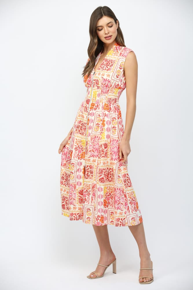 Fate Nora patchwork midi dress featuring a stylish, colorful patchwork pattern and a flowing midi-length silhouette.