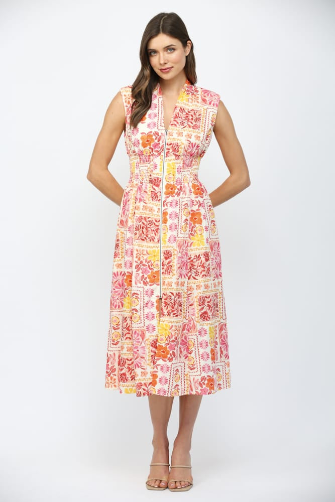 Fate Nora Patchwork Midi Dress displayed on a hanger, showcasing its vibrant patchwork design and flowing midi length.