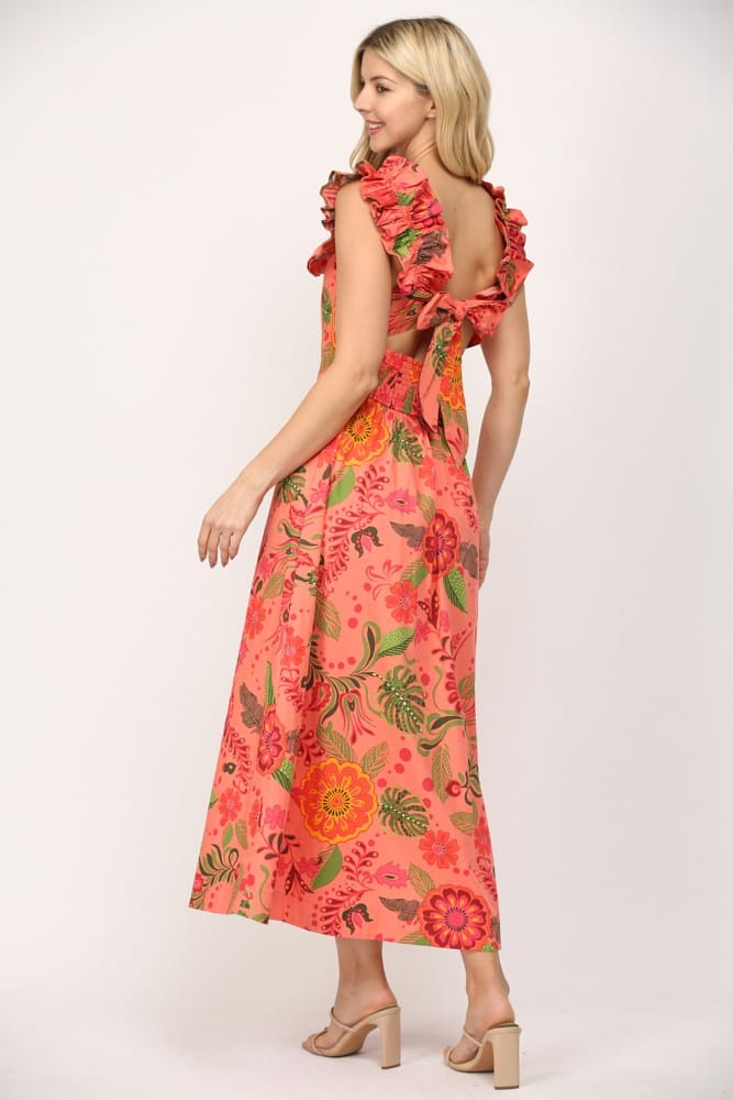 Fate Sophie Ruffled Cut-out Midi Dress displayed on a mannequin, featuring ruffles, cut-outs, and a flowing midi length.