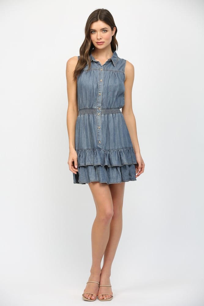 Fate Eva Tencel Mini Dress displayed on a hanger, showcasing its lightweight, flowy fabric and stylish design.