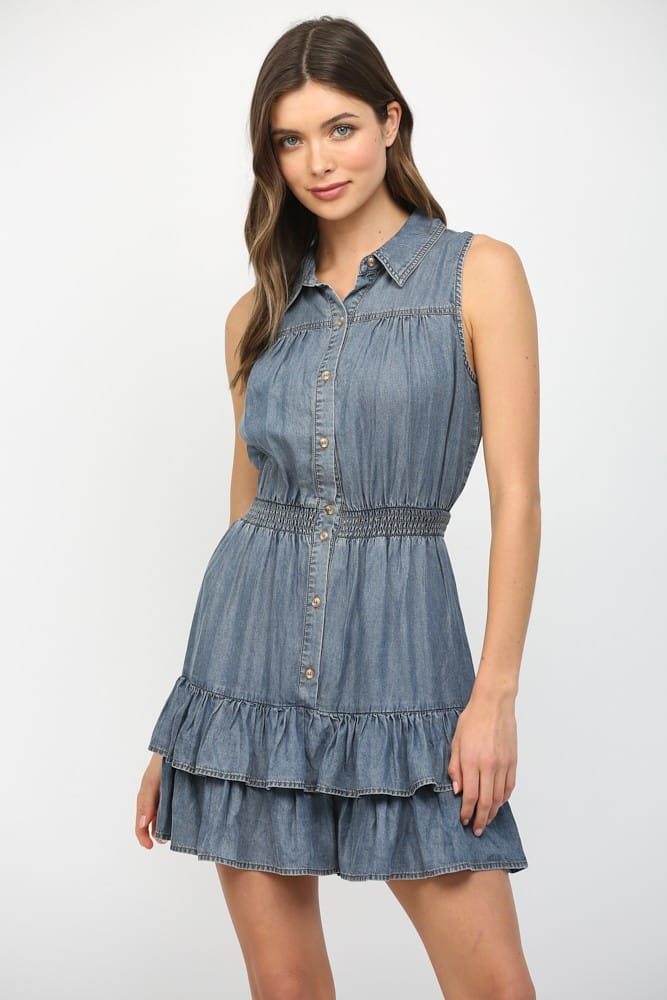Fate Eva Tencel Mini Dress displayed on a hanger, featuring a sleek, lightweight Tencel fabric with a modern mini silhouette.