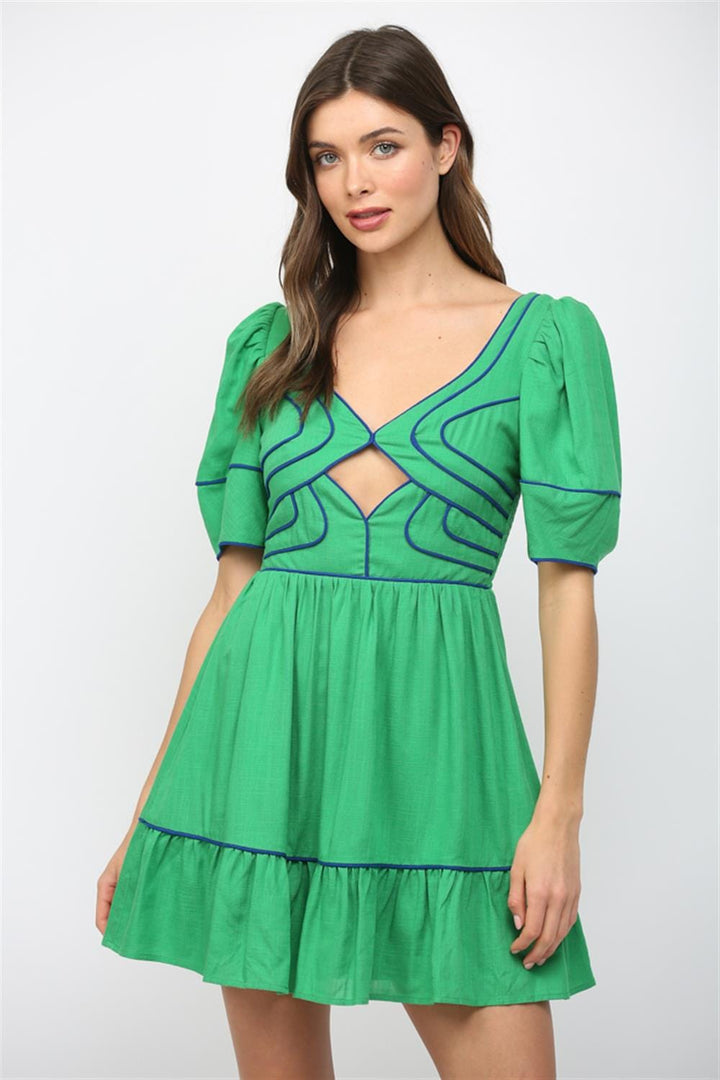 Green Fate Trinity open-back mini dress, stylish sleeveless design with a fitted silhouette and open back detail.