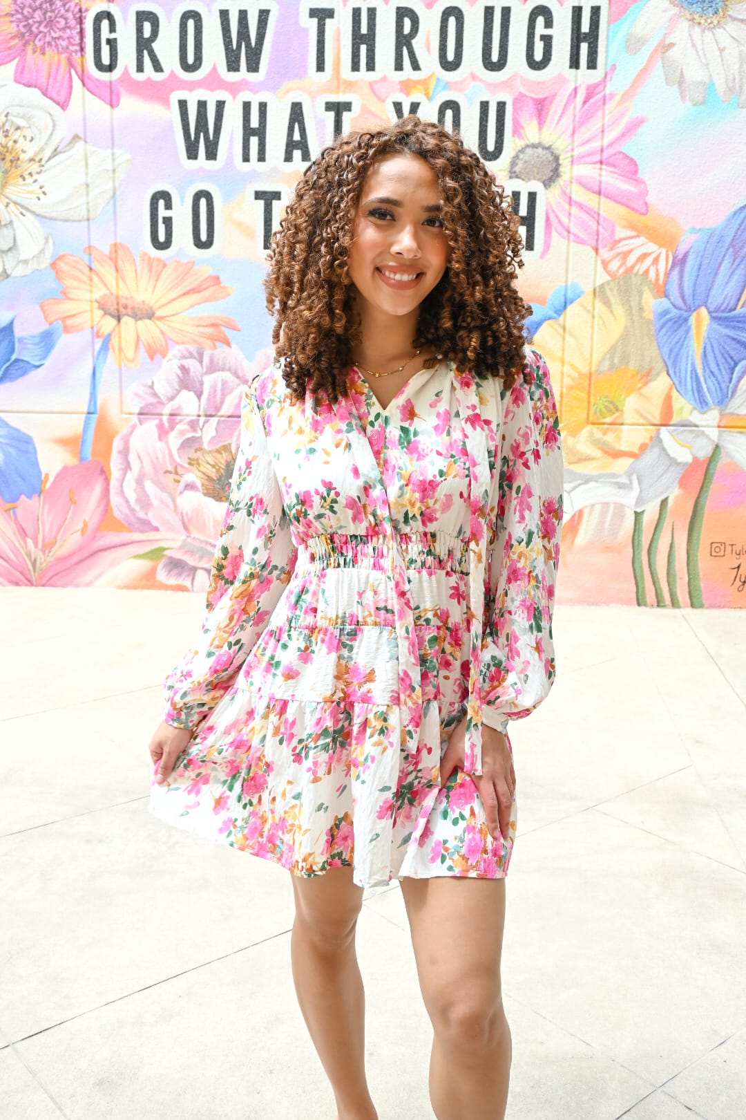 Fate Helena Smocked Mini Dress featuring a fitted bodice, short sleeves, and a playful, casual style for warm weather.