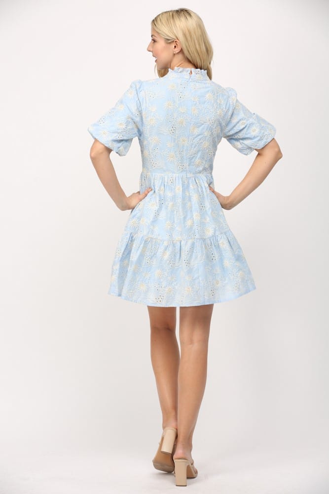 Fate Layla Broderie Dress, a stylish mini dress with intricate embroidery, shown on a model highlighting its detailed design.