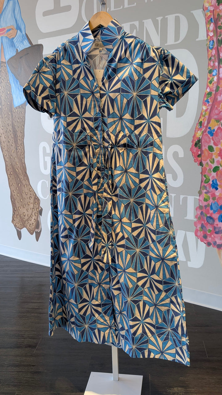 Holly Shae Bria Maxi Dress in Kaleidoscope Blue, showing a flowy sleeveless dress with vibrant blue patterns and a fitted waist.