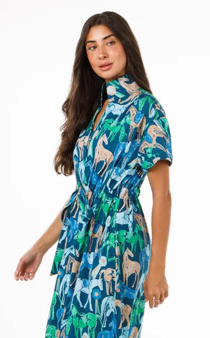 Holly Shae Bria Midi Dress in a flowing fabric with a fitted bodice and flared skirt, showcased on a mannequin.