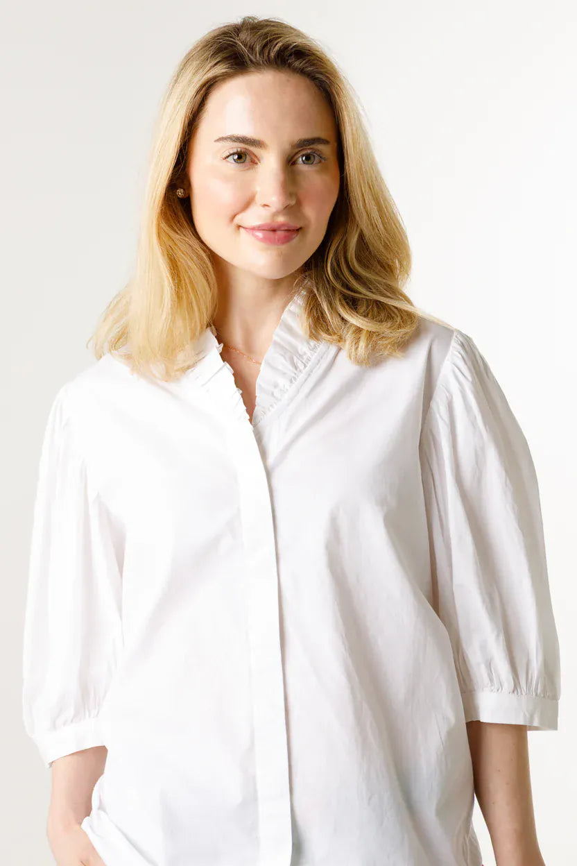 White Holly Shae Laura Top shown on a mannequin, featuring a fitted sleeveless design with a round neckline.