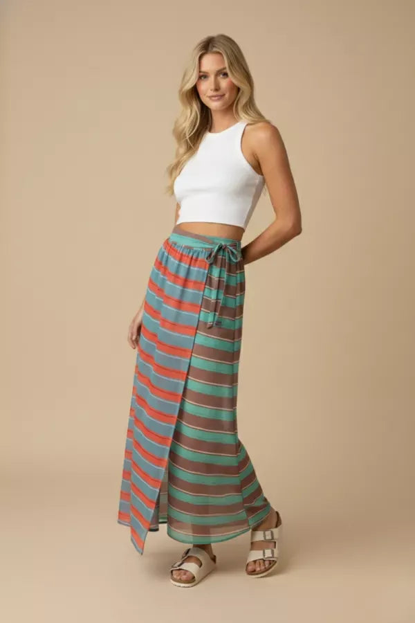 J.NNA Sunset Stripe Maxi Skirt with wrap design featuring vibrant sunset-inspired stripe pattern