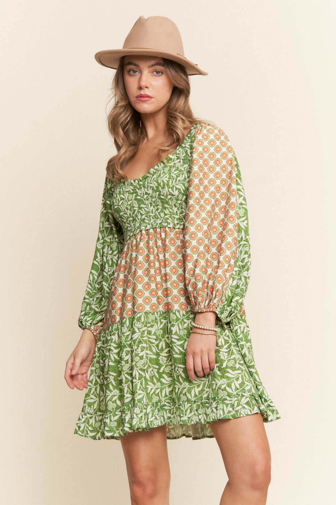 Green J.NNA Milie Pattern Mini Dress with a stylish mini length and vibrant design, perfect for casual or dressy occasions.