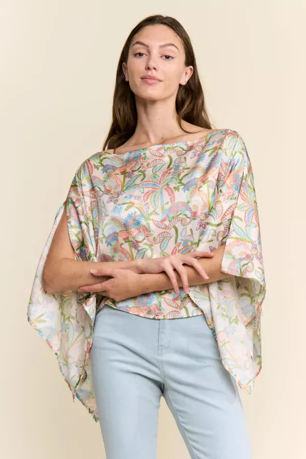 J.NNA Sunset Palm Drape Top in blue, lightweight fabric with tropical palm print, stylish short-sleeve design.