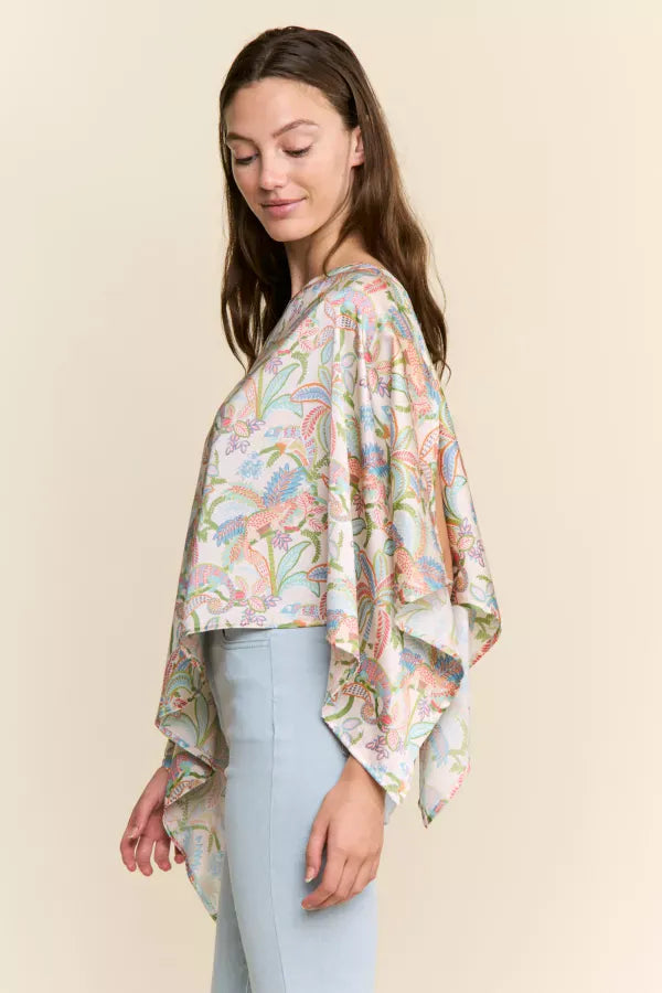 J.NNA Sunset Palm Drape Top featuring a flowy fabric with sunset and palm leaf print, stylish women&