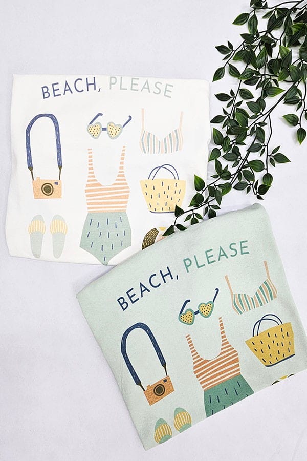 Jade by Jane Beach Please graphic tee featuring colorful beach-themed design on soft cotton fabric.