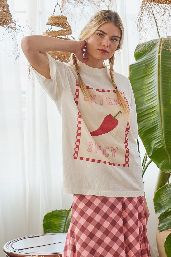 Extra Spicy Checkerboard Graphic Tee by Jade by Jane featuring bold checkerboard design on a casual tee shirt.