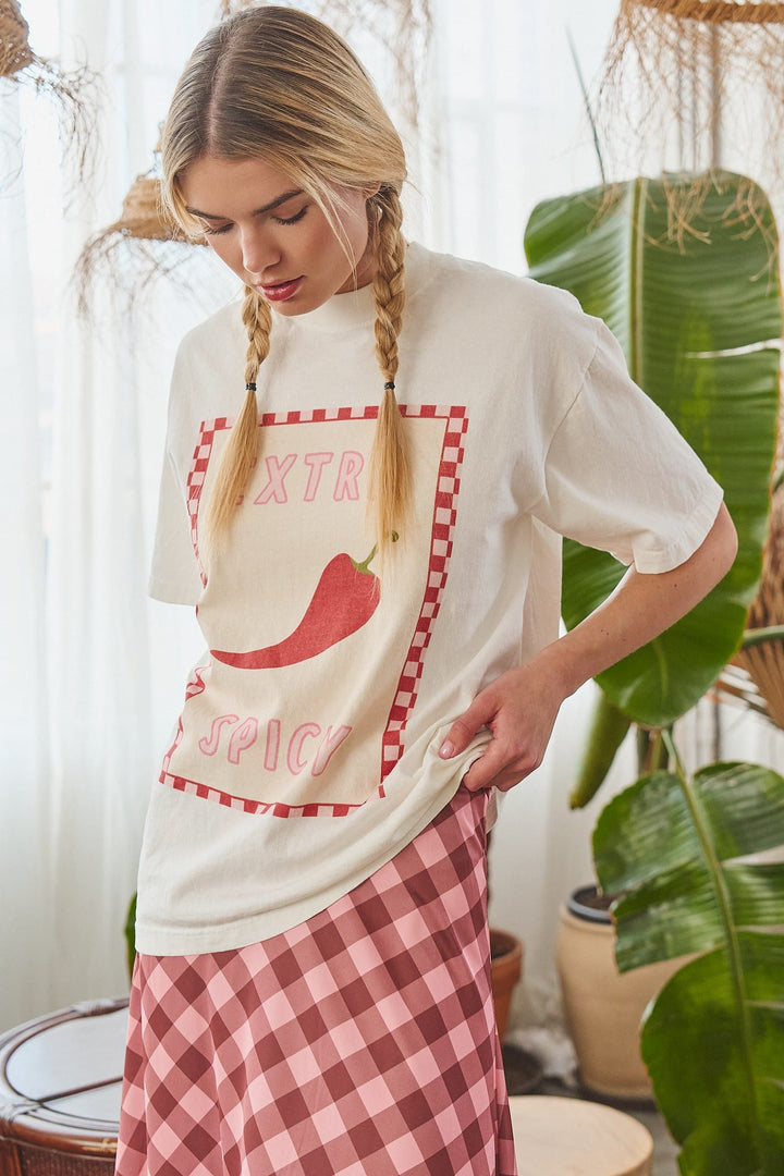Extra Spicy Checkerboard Graphic Tee by Jade by Jane featuring a bold checkerboard design on a casual T-shirt.