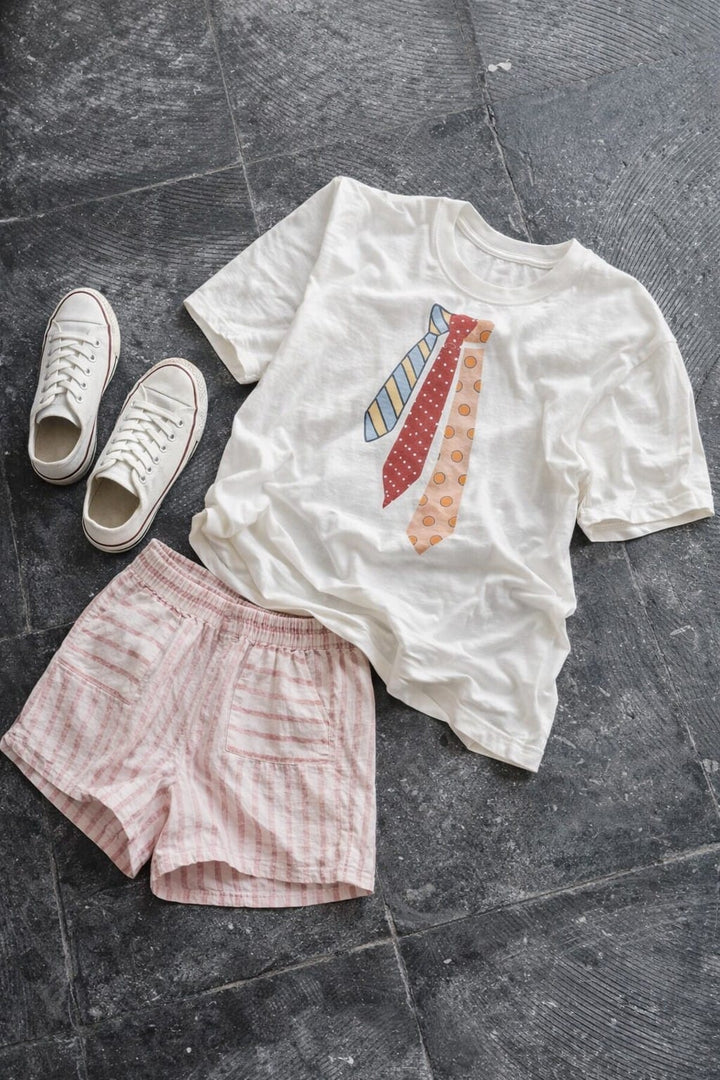 Jade by Jane novelty tie graphic tee featuring a playful tie design on a casual graphic t-shirt.