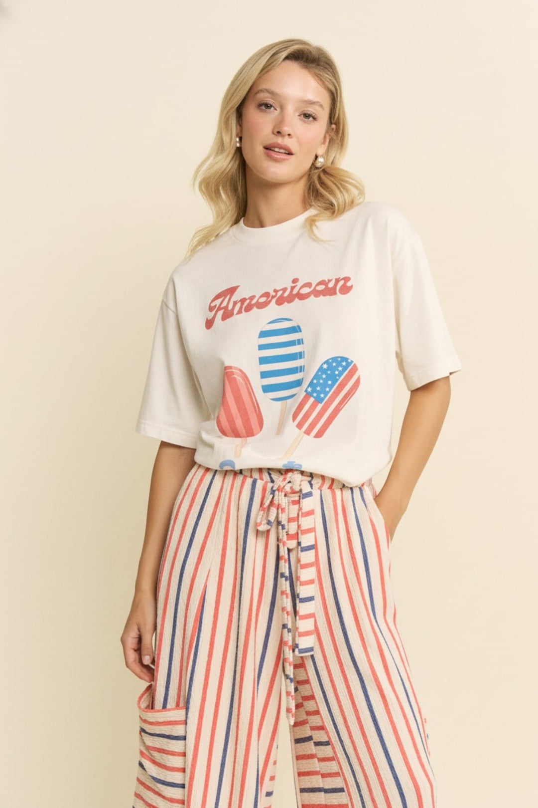 White American Sweets graphic tee by Jade by Jane featuring colorful candy and dessert illustrations on the front.