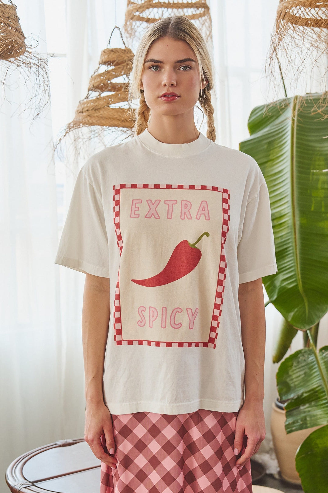 Jade by Jane extra spicy checkerboard graphic tee featuring bold black and red checkered design on a casual cotton shirt