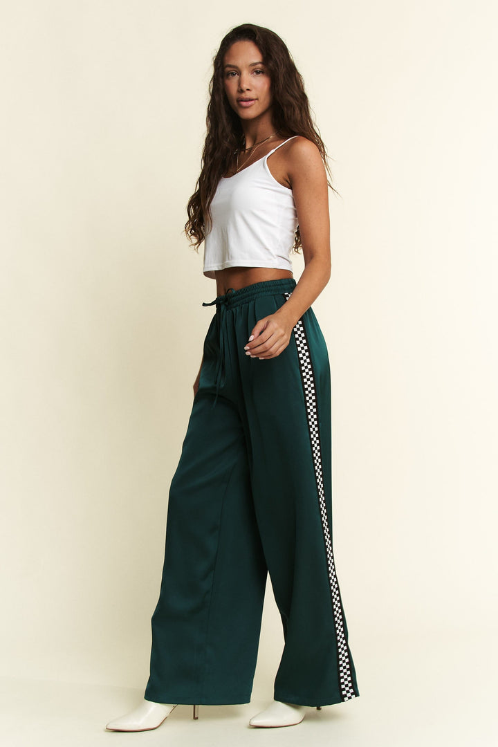 Jade by Jane Isabel satin sweatpants in a relaxed fit, featuring smooth satin fabric and elastic waistband.