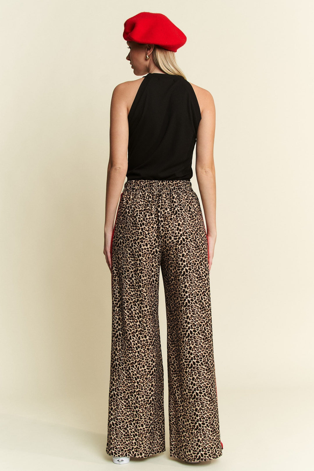 Jade by Jane Veda Leopard Contrast Pants featuring leopard print and stylish contrast details, displayed on a model.