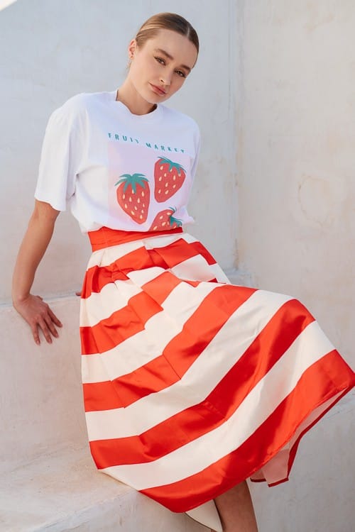 Jade by Jane Piper pleated midi skirt with flowing fabric and high waist, displayed on a neutral background.