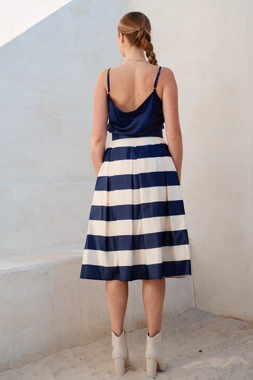 Jade by Jane Piper pleated midi skirt in a flowing fabric, featuring a stylish pleated design and midi length.