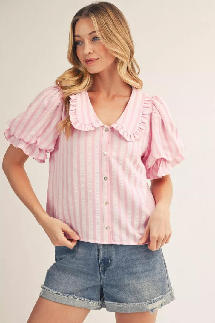 Jodifl Gabriela puff sleeve top featuring a stylish fit with puffed sleeves and a round neckline, made from lightweight fabric.